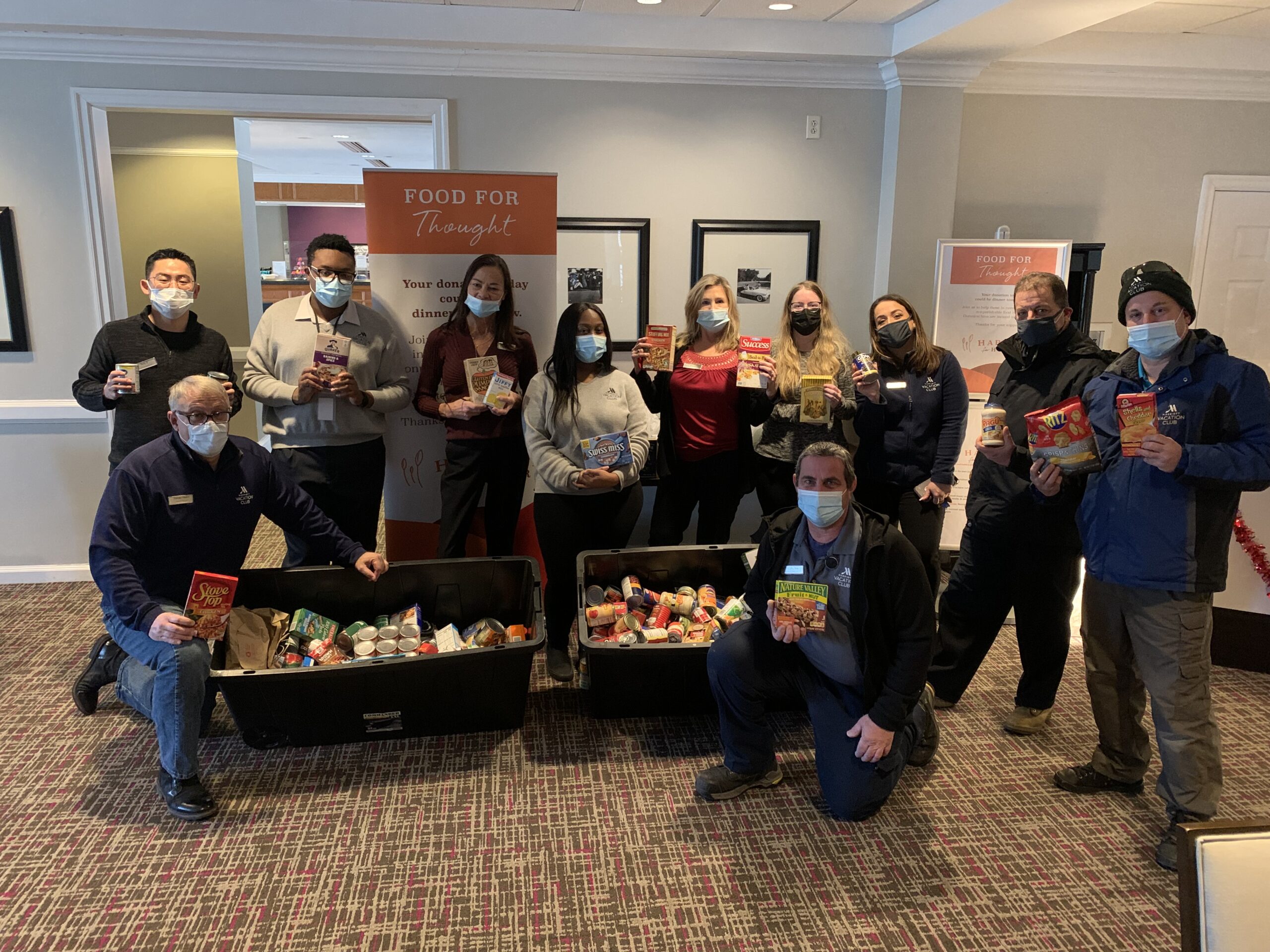 Associates collecting food donations