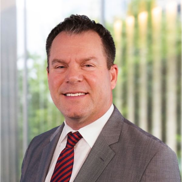 Michael (Mike) A. Flaskey, President and COO